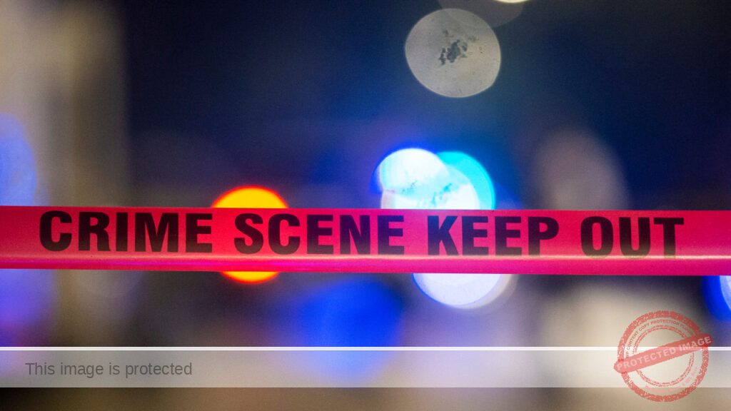 Man, 21, found shot to death in West Town