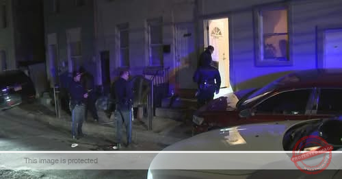 Man shot and killed at Philadelphia apartment building, person of interest in custody, police say